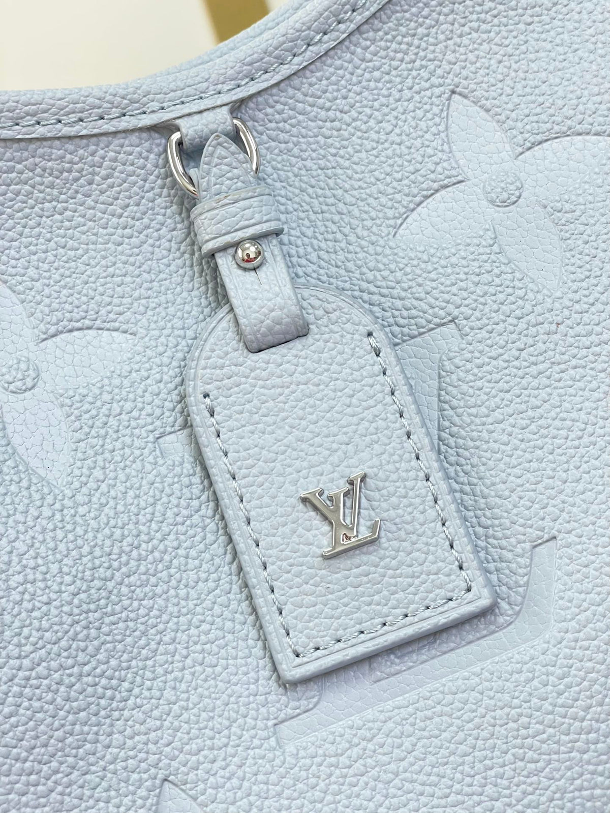 CARRYALL PM 29 IN BEAU BLUE MONOGRAM EMPREINTE LEATHER