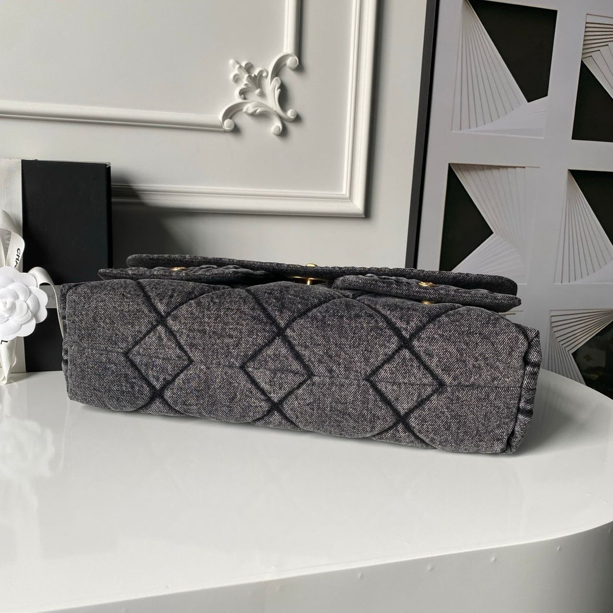 Chanel Maxi Flapbag in washed denim with gold-tone metal hardware
