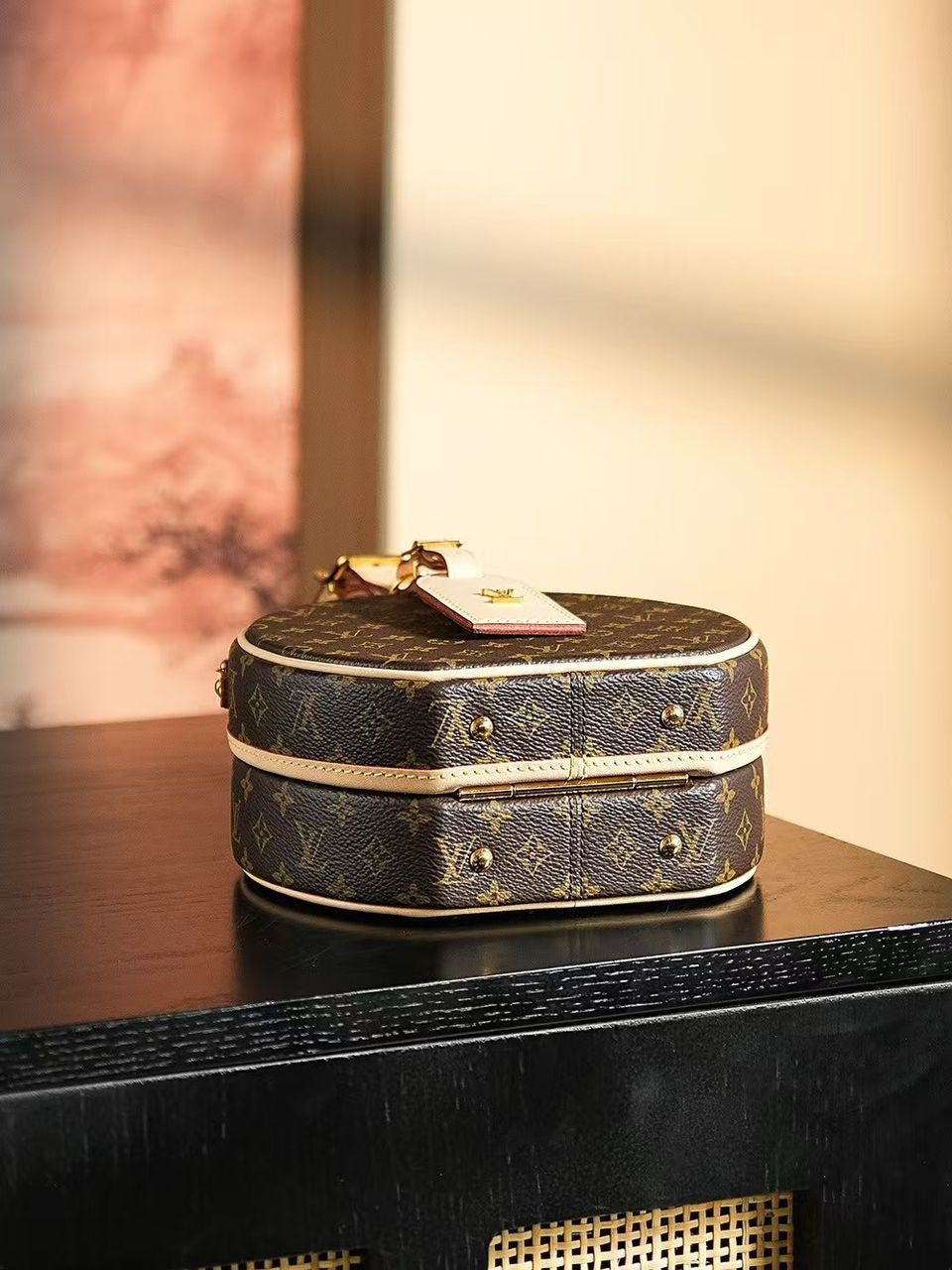 Louis Vuitton Petite Boite Chapeau handbag in Monogram canvas