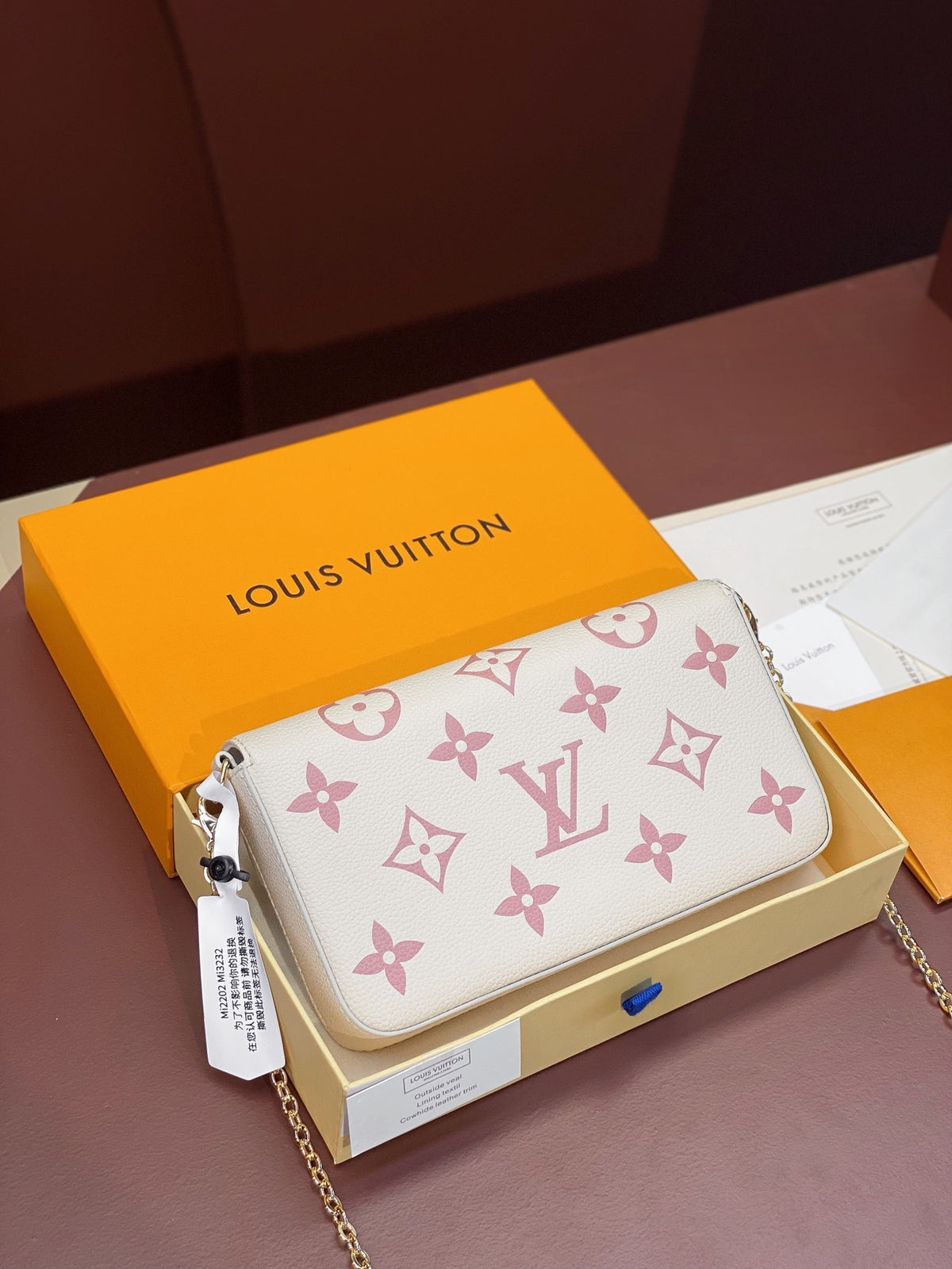 Louis Vuitton Félicie Pochette in black and beige Bicolor