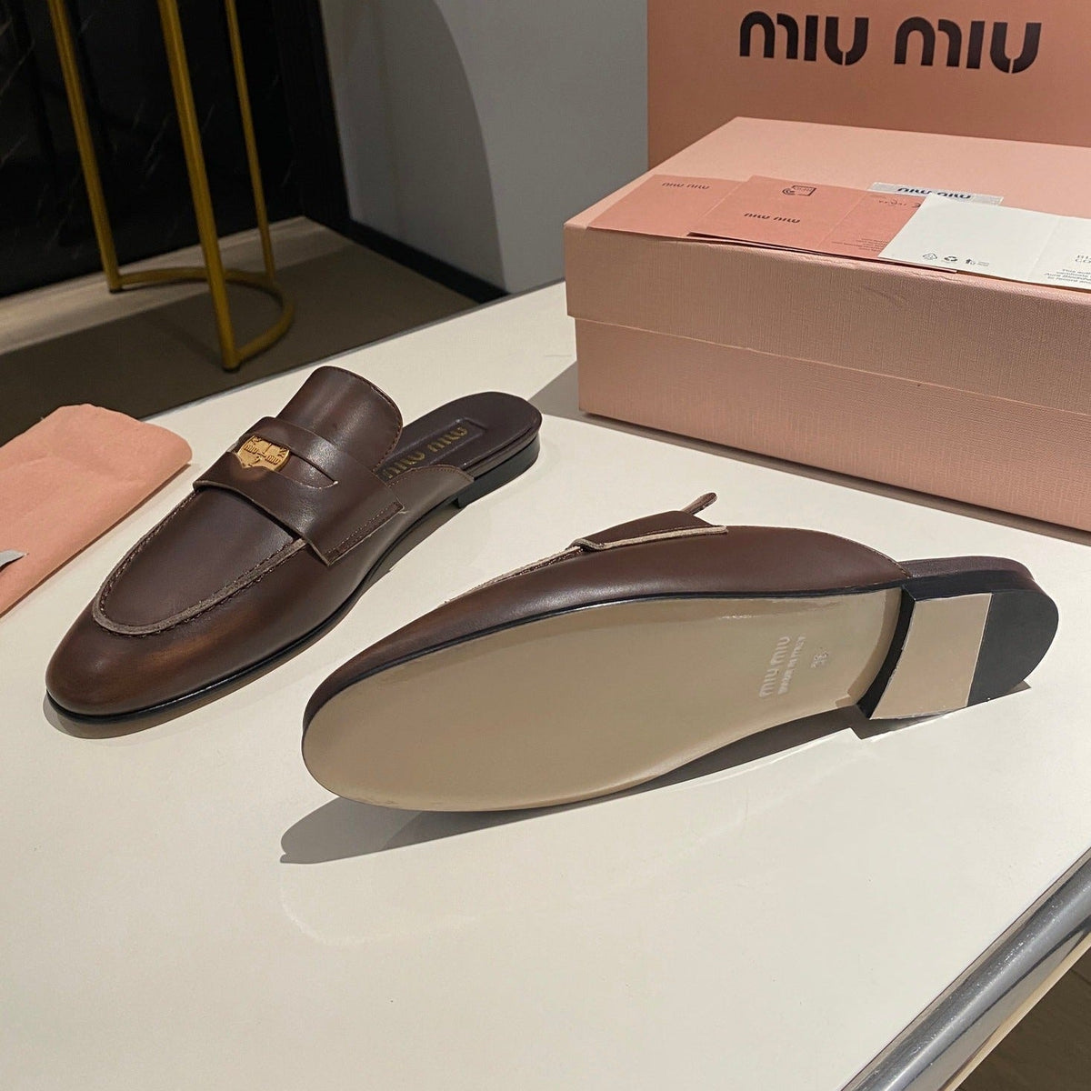 MULES SLIPPERS CHOCOLATE COLOR COWHIDE WITH GOLD COIN
