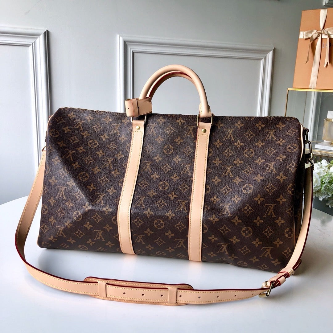 LV Monogram Canvas Keepall Bandoulière 55 Leather Duffle Bag