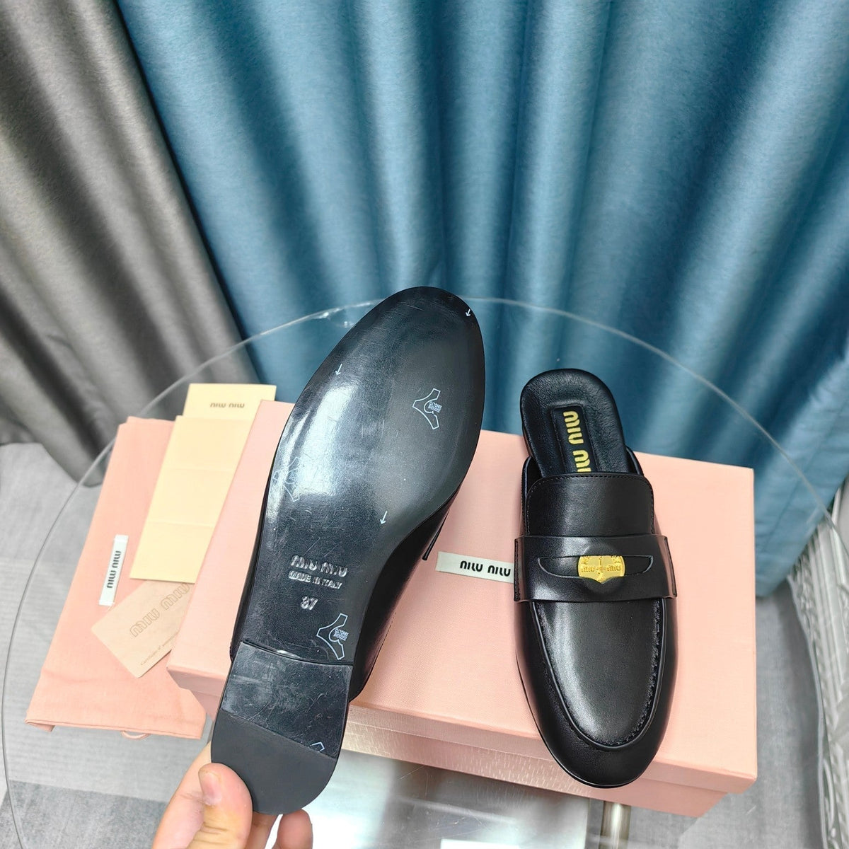 MULES SLIPPERS BLACK COWHIDE WITH GOLD COIN