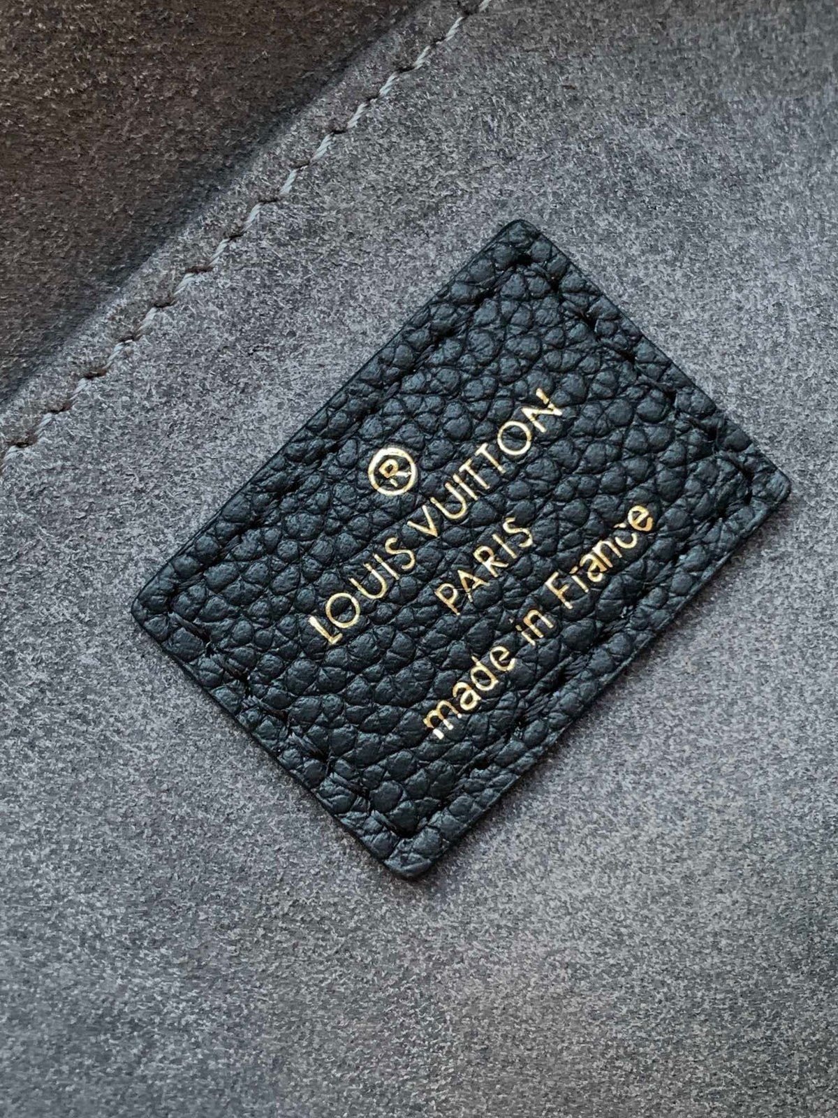 LV MADELEINE 30 IN BLACK MIX WHITE MONOGRAM CALFSKIN EMBOSSED LOGO