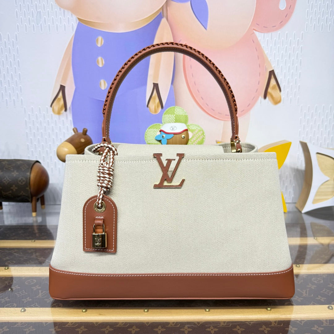 Louis Vuitton Capucines Weekender Bag Tan Canvas