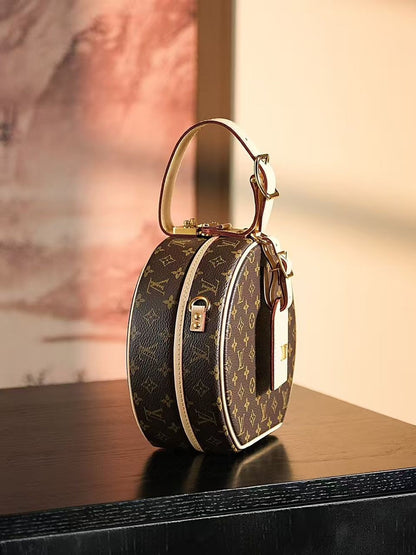 Louis Vuitton Petite Boite Chapeau handbag in Monogram canvas