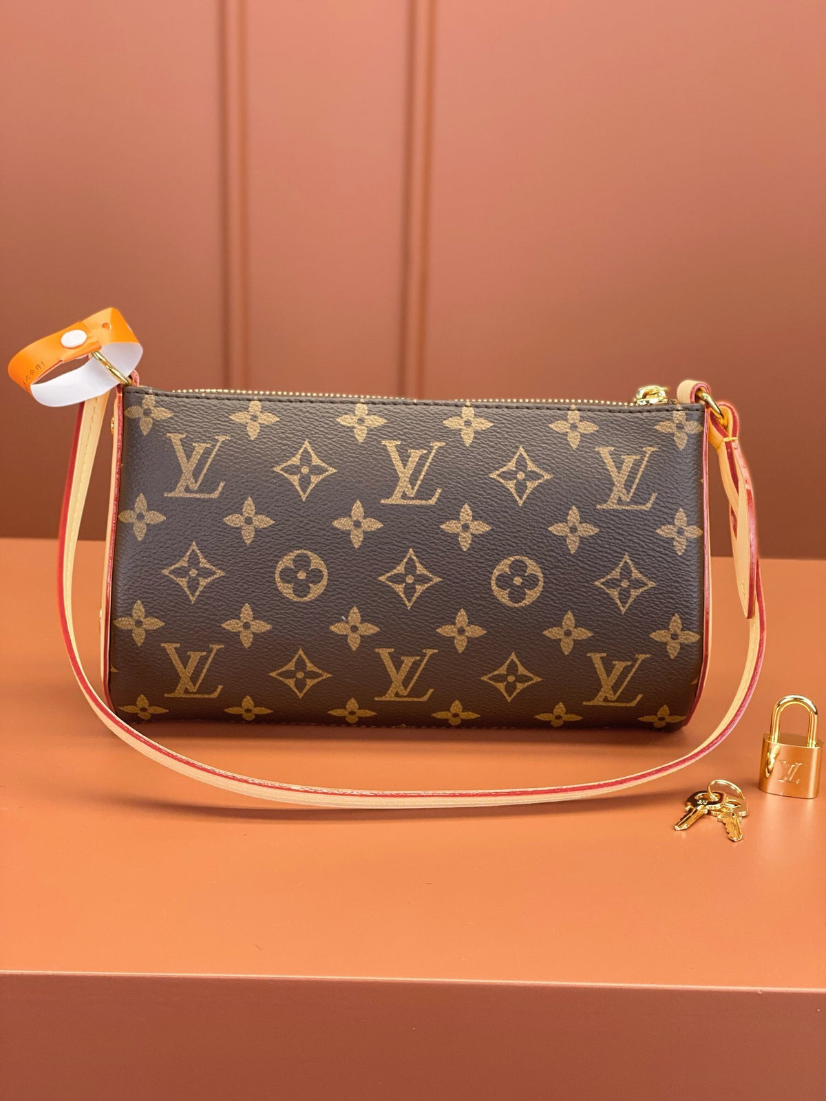 Louis Vuitton Pochette Tirette bag in monogram coated canvas