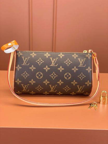 Louis Vuitton Pochette Tirette bag in monogram coated canvas
