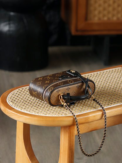 Louis Vuitton Vanity Chain Pouch in monogram coated canvas