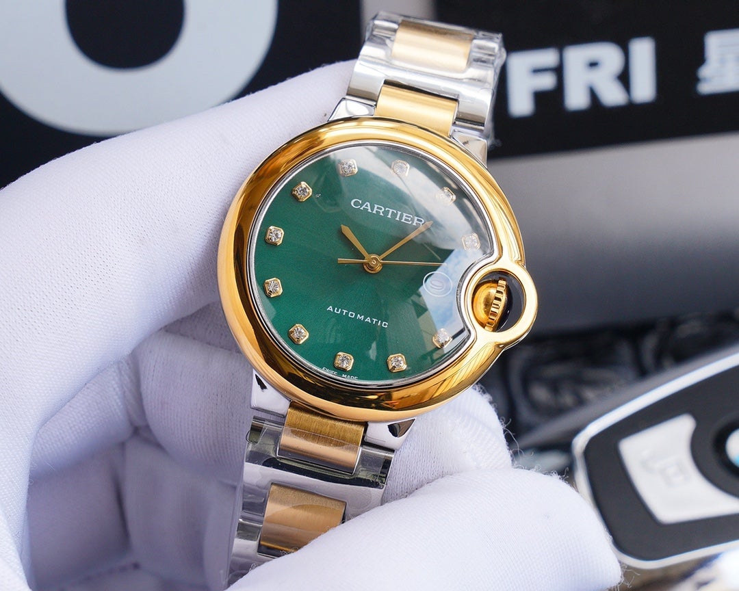 BALLON BLEU 33MM GOLD GREEN DIAL DIAMOND NUMERALS