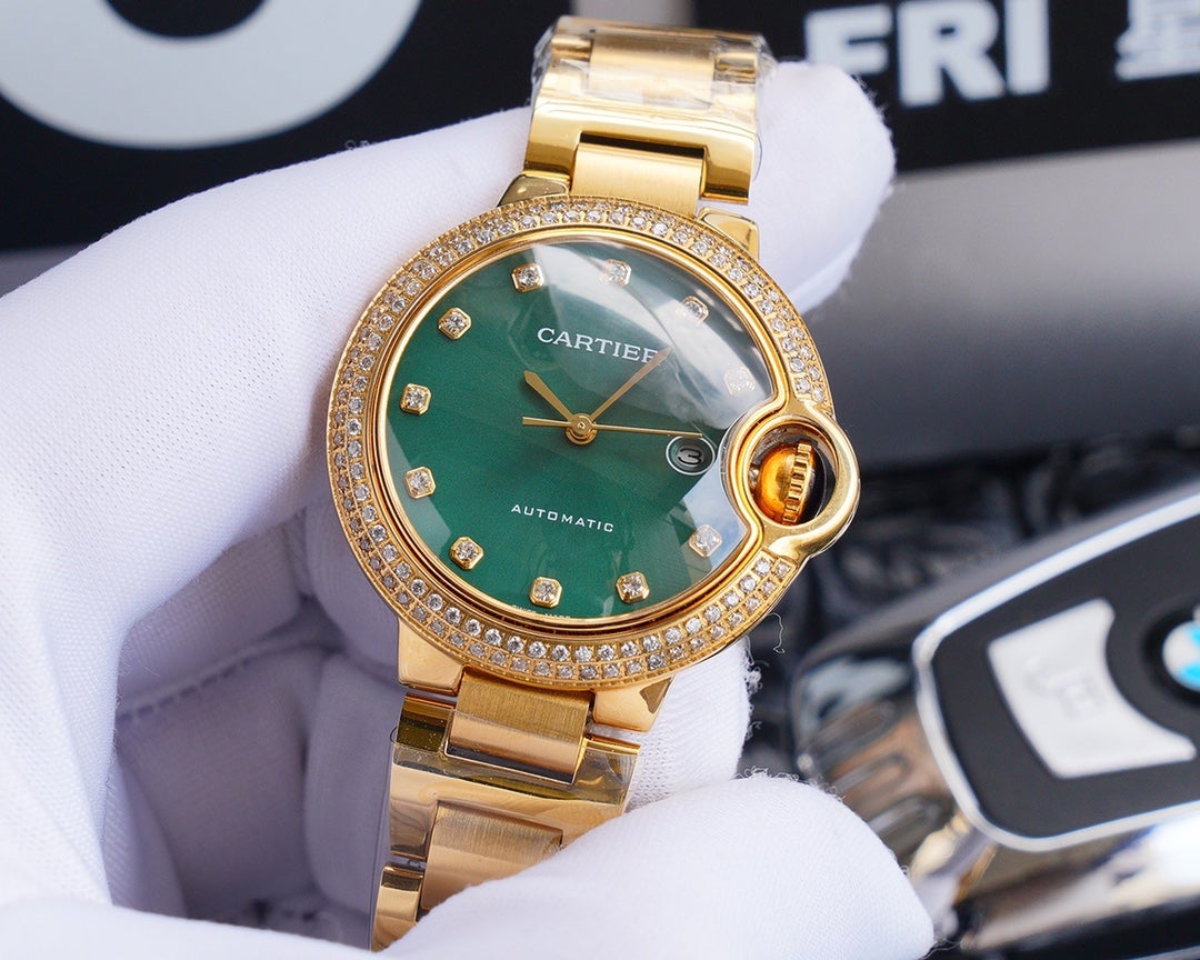 BALLON BLEU 33MM GOLD GREEN DIAL DIAMOND NUMERALS