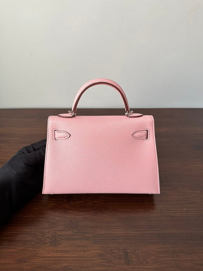 HN Mini Kelly 20 bag in Rose Sakura leather with silver hardware