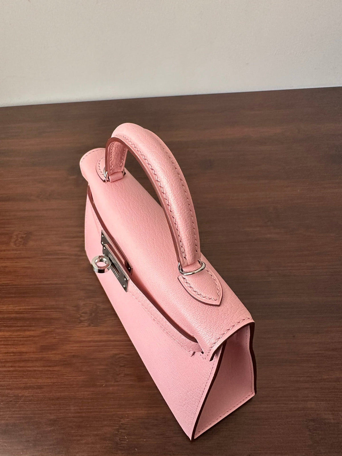 HN Mini Kelly 20 bag in Rose Sakura leather with silver hardware