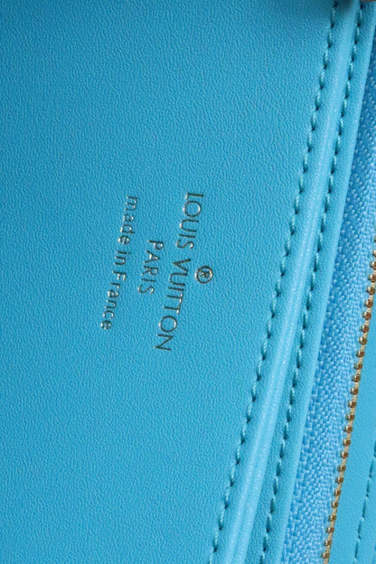 ZIPPY WALLET 19 CLOUD BLUE EMBOSSED LAMBSKIN