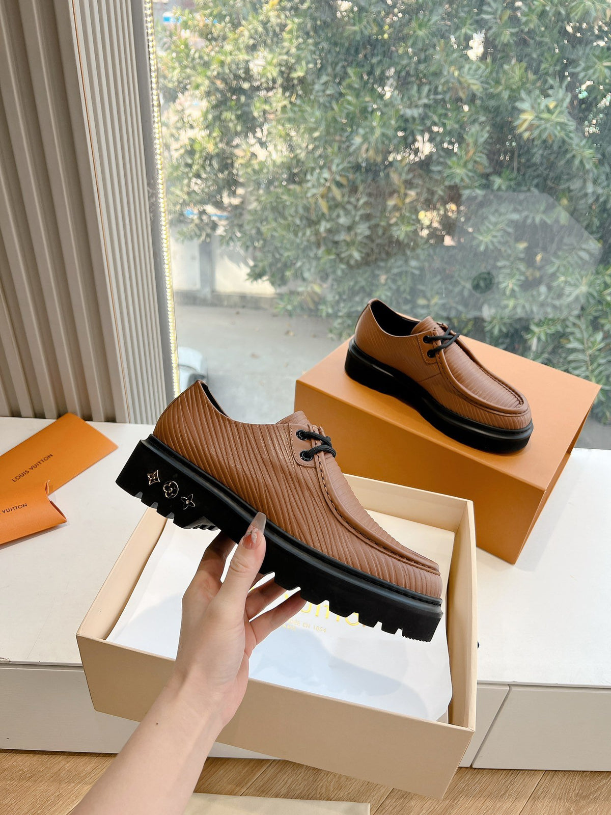 LV Women Brown Textured Leather Loafers