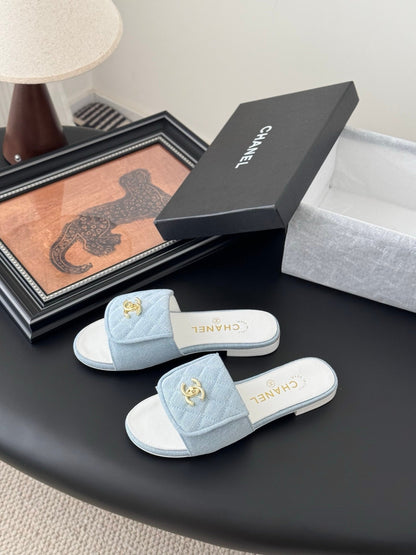 Chanel Women Light Blue Quilted Fabric Slides
