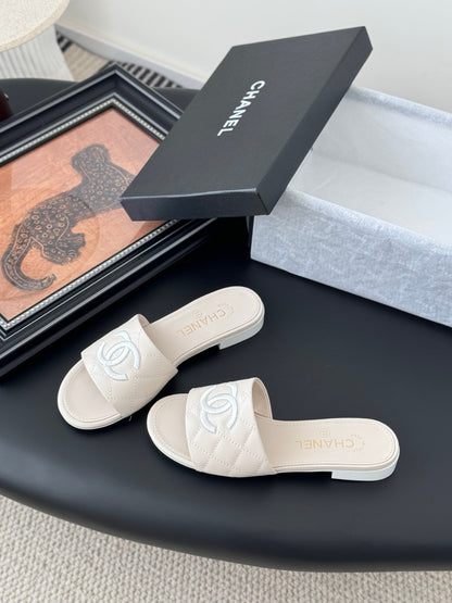 Chanel Women Cream Quilted Leather Slides