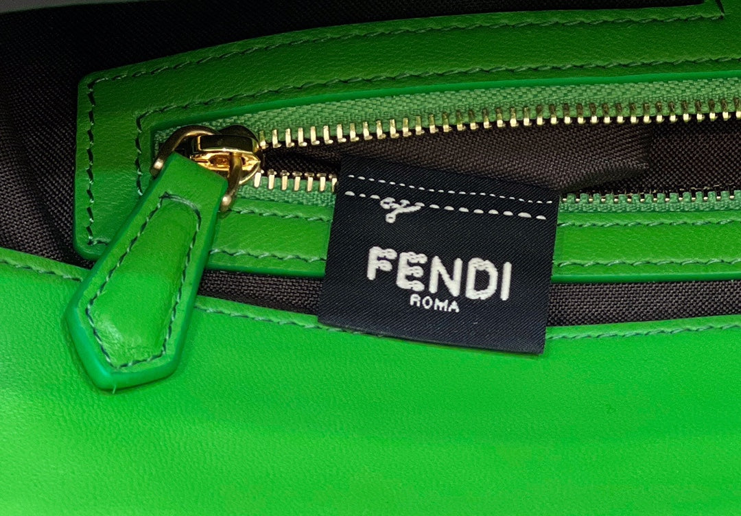 BAGUETTE WITH FF MOTIF 27 IN EMERALD GREEN SOFT LAMBSKIN GOLD HARDWARE