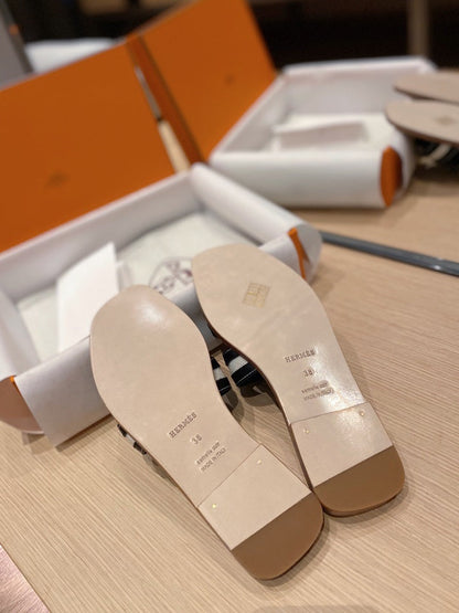 0RAN SANDALS IN BLACK CALFSKIN AND WHITE CANVAS