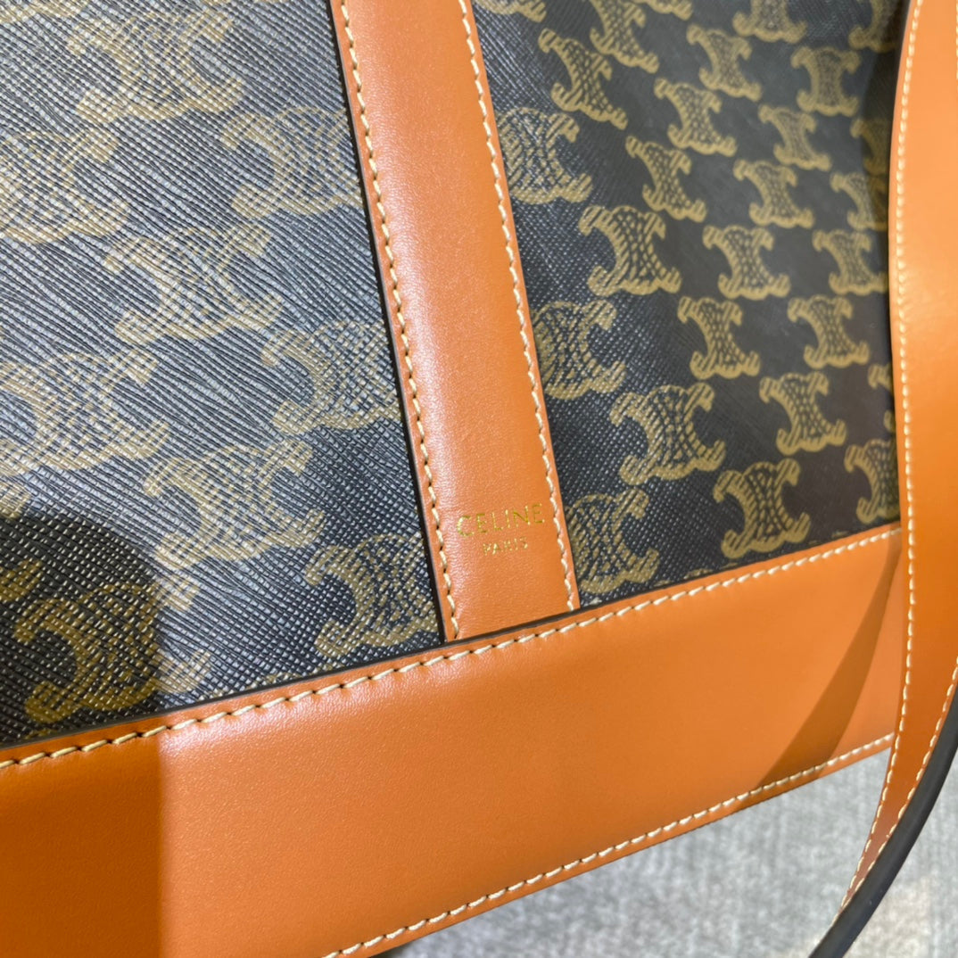 BUCKET 33 IN BLACK TRIOMPHE CANVAS AND BRONZE BROWN CALFSKIN TRIM