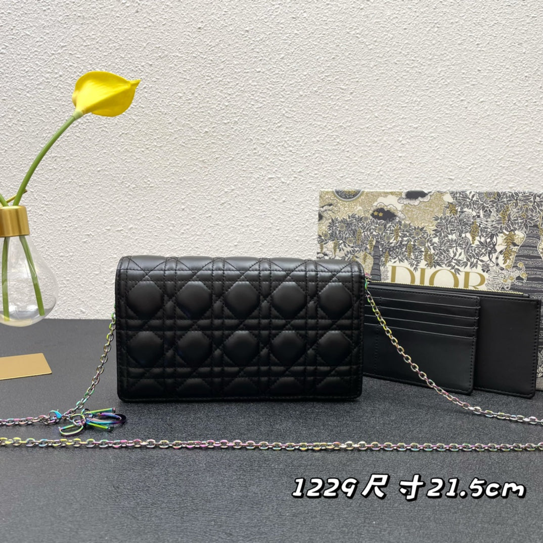CARO SLIM POUCH 21 BAG IN BLACK CALFSKIN