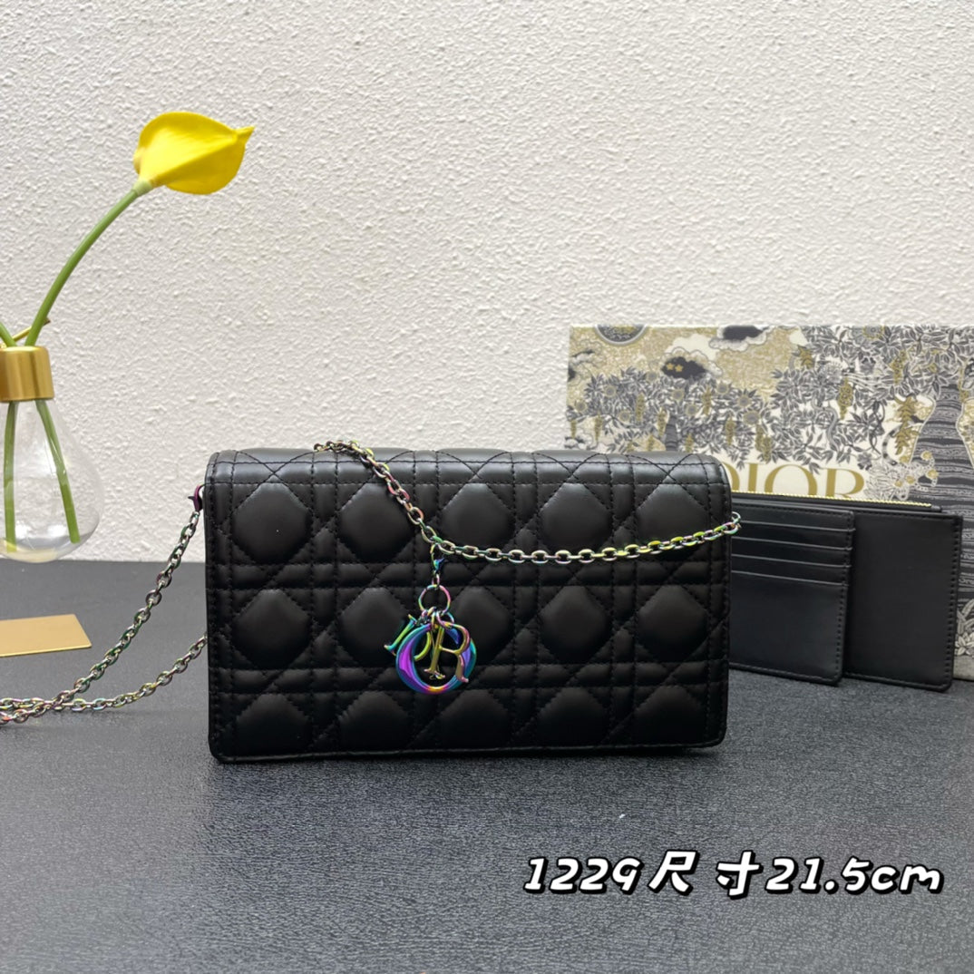 CARO SLIM POUCH 21 BAG IN BLACK CALFSKIN