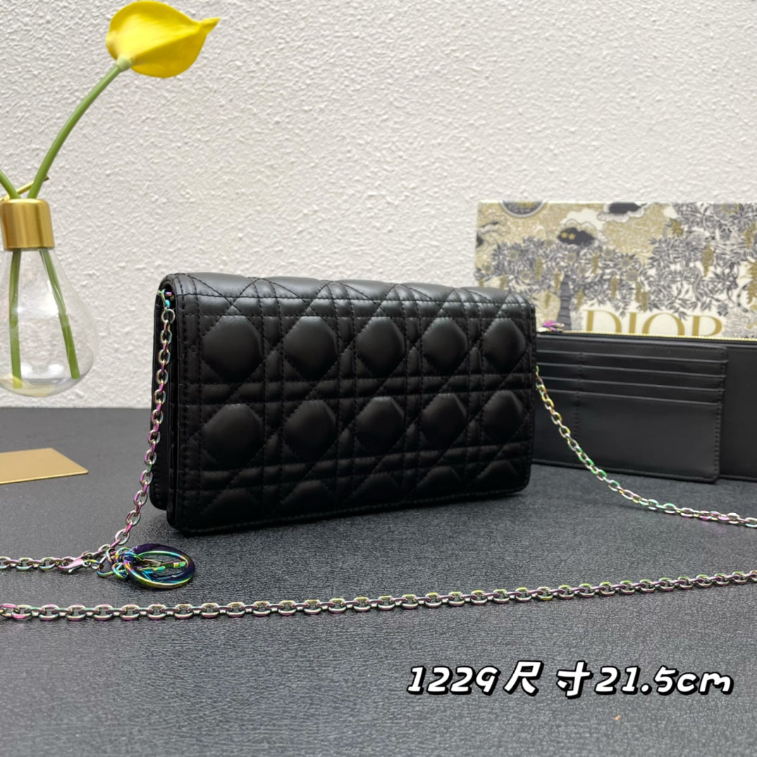 CARO SLIM POUCH 21 BAG IN BLACK CALFSKIN