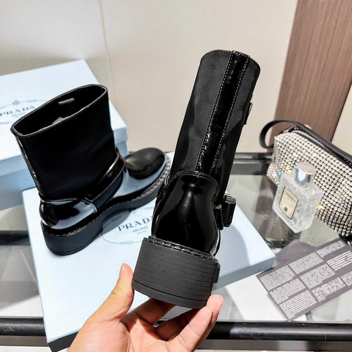ANKLE BOOTS WITH STRAP IN BLACK CALFSKIN