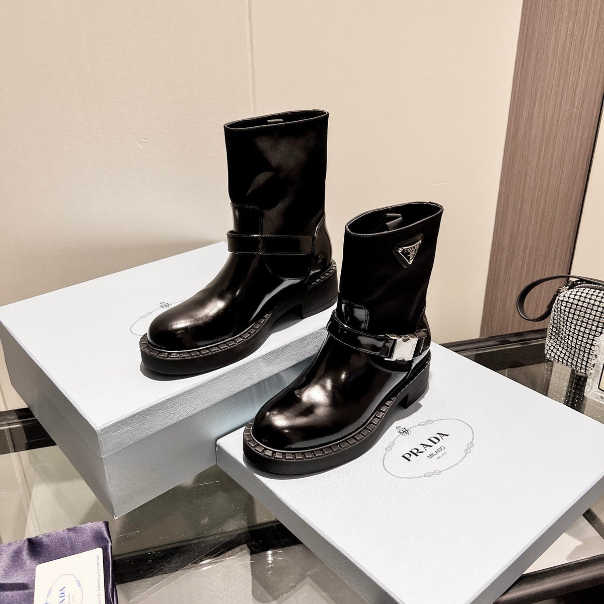 ANKLE BOOTS WITH STRAP IN BLACK CALFSKIN