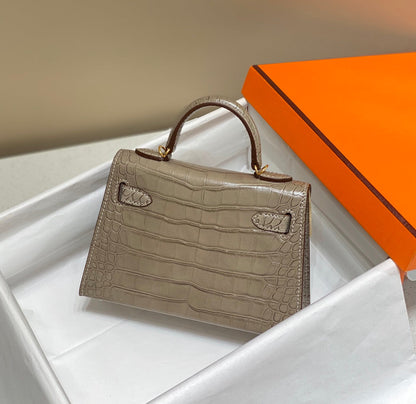 HN MINI KELLY IN MOCHA BROWN CROCODILE SKIN GOLD HARDWARE