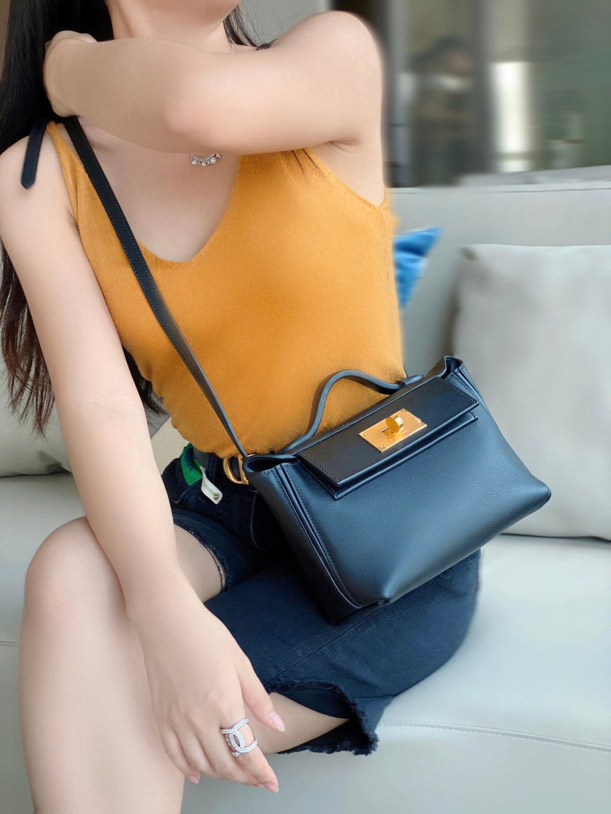 MINI 24/24 21CM IN BLACK EVERCOLOR CALFSKIN GOLD KELLY BUCKLE