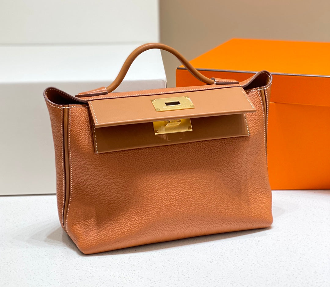 MINI 24/24 29CM IN ORANGE MINIMUM EVERCOLOR CALFSKIN GOLD KELLY BUCKLE