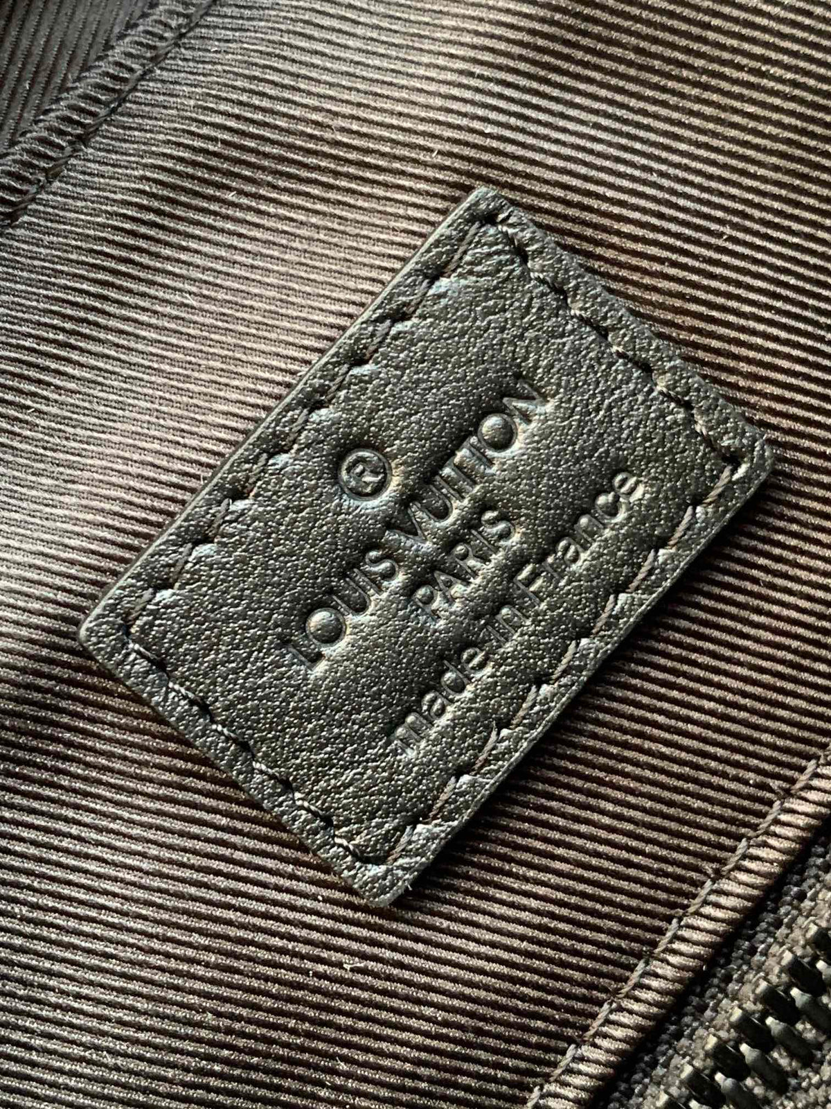 DISCOVERY BACKPACK 54 IN BLACK EMBOSSED MONOGRAM CALFSKIN