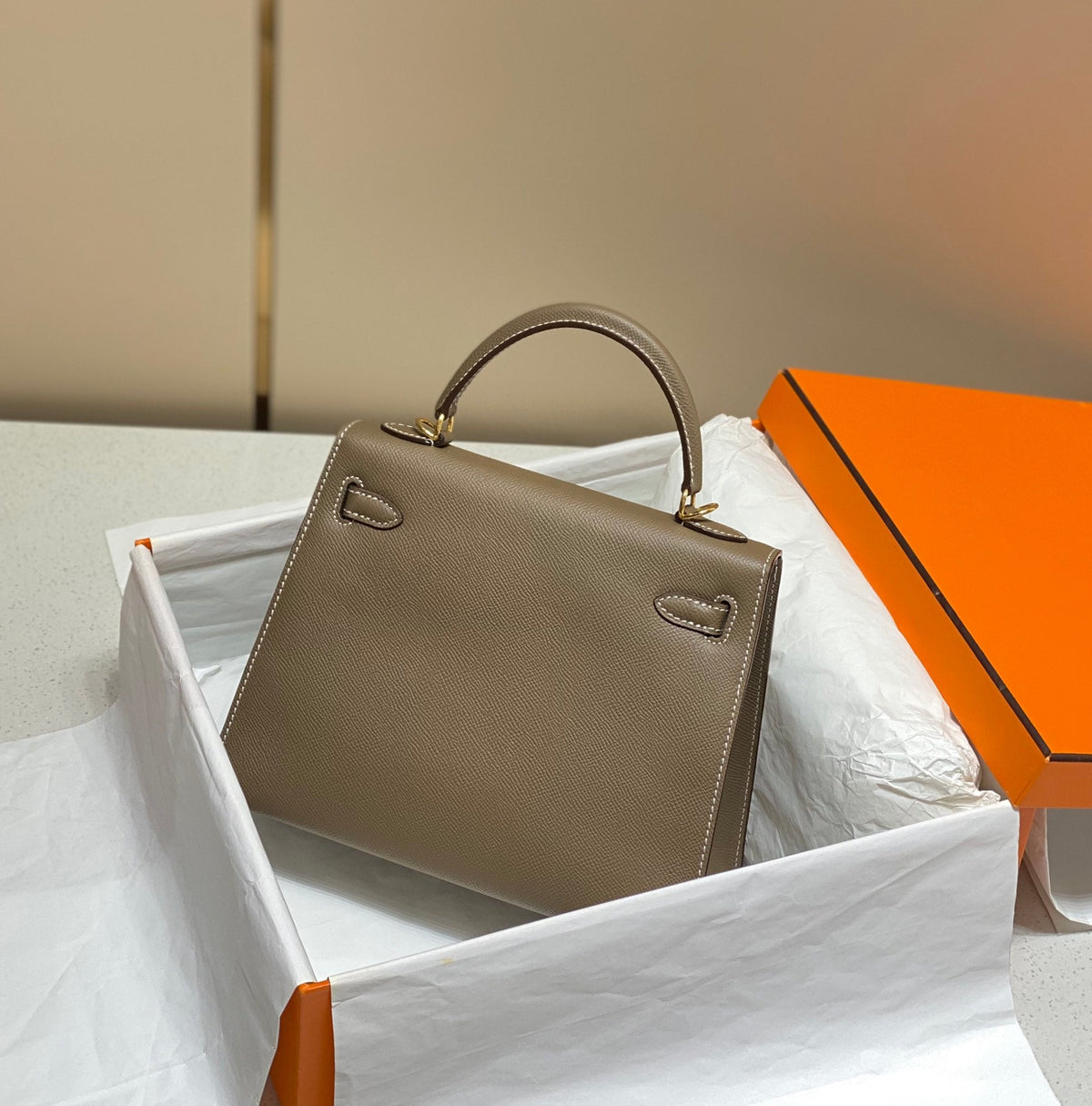 HN 25 bag in Etoupe Epsom leather with gold hardware