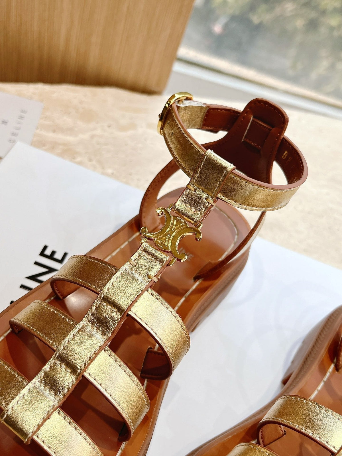 LYMPIA GLADIATOR SANDAL IN GOLD METALLIC CALFSKIN