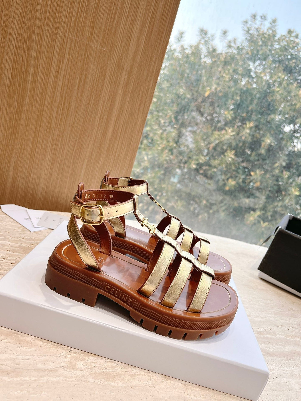LYMPIA GLADIATOR SANDAL IN GOLD METALLIC CALFSKIN