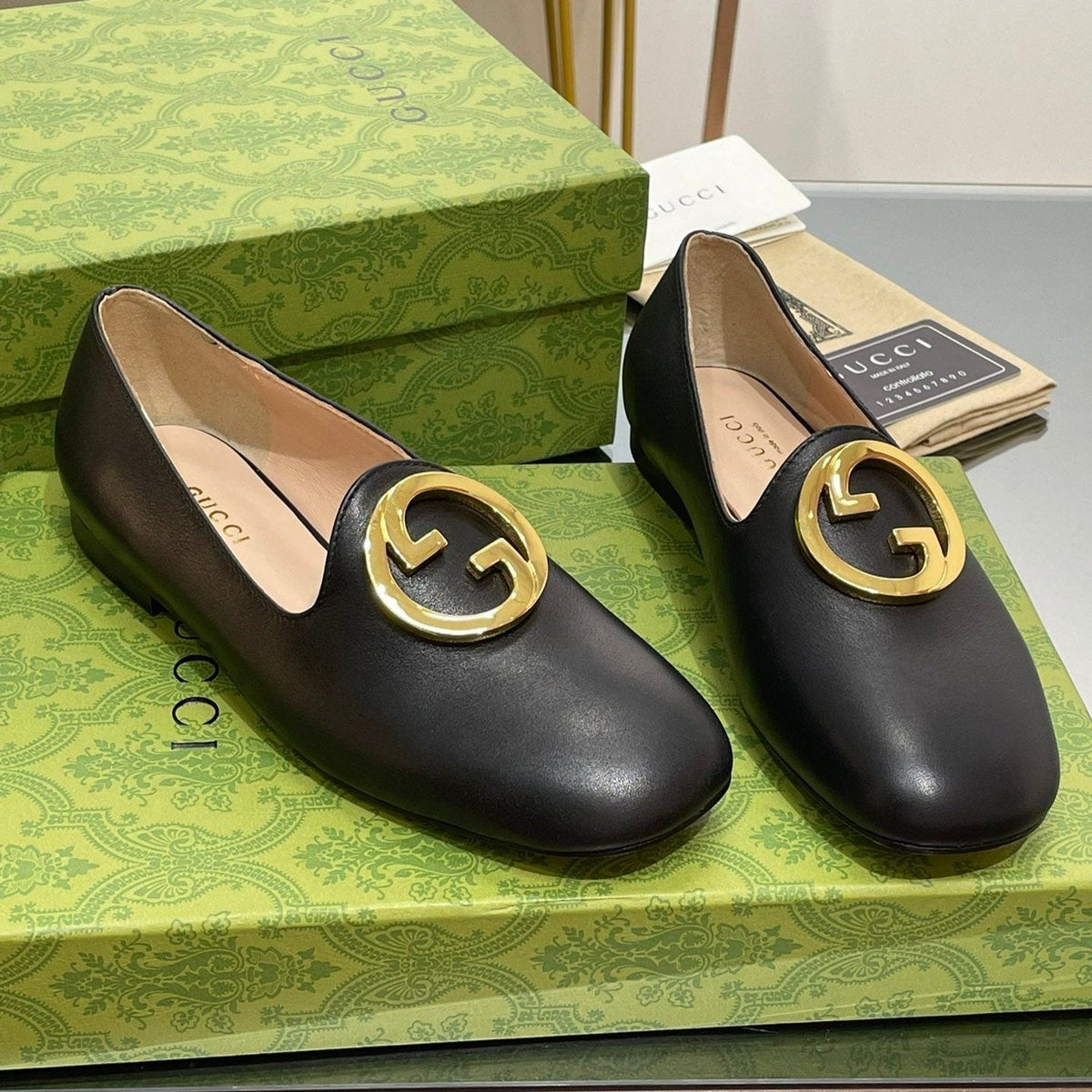 BLONDIE LOGO-PLAQUE LOAFERS IN BLACK CALFSKIN WITH GOLD HARDWARE