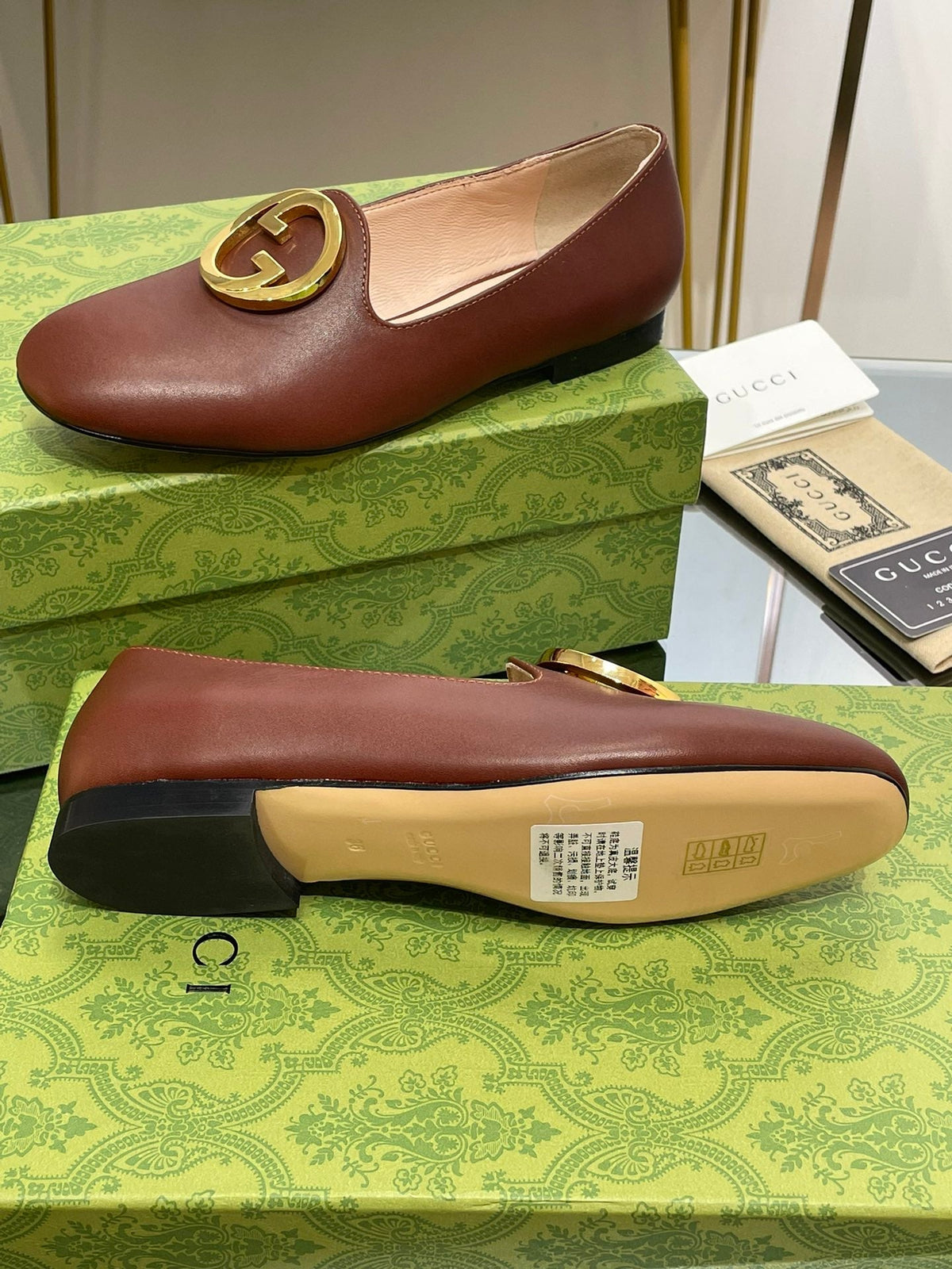 BLONDIE LOGO-PLAQUE LOAFERS IN SYRUP BROWN CALFSKIN WITH GOLD HARDWARE