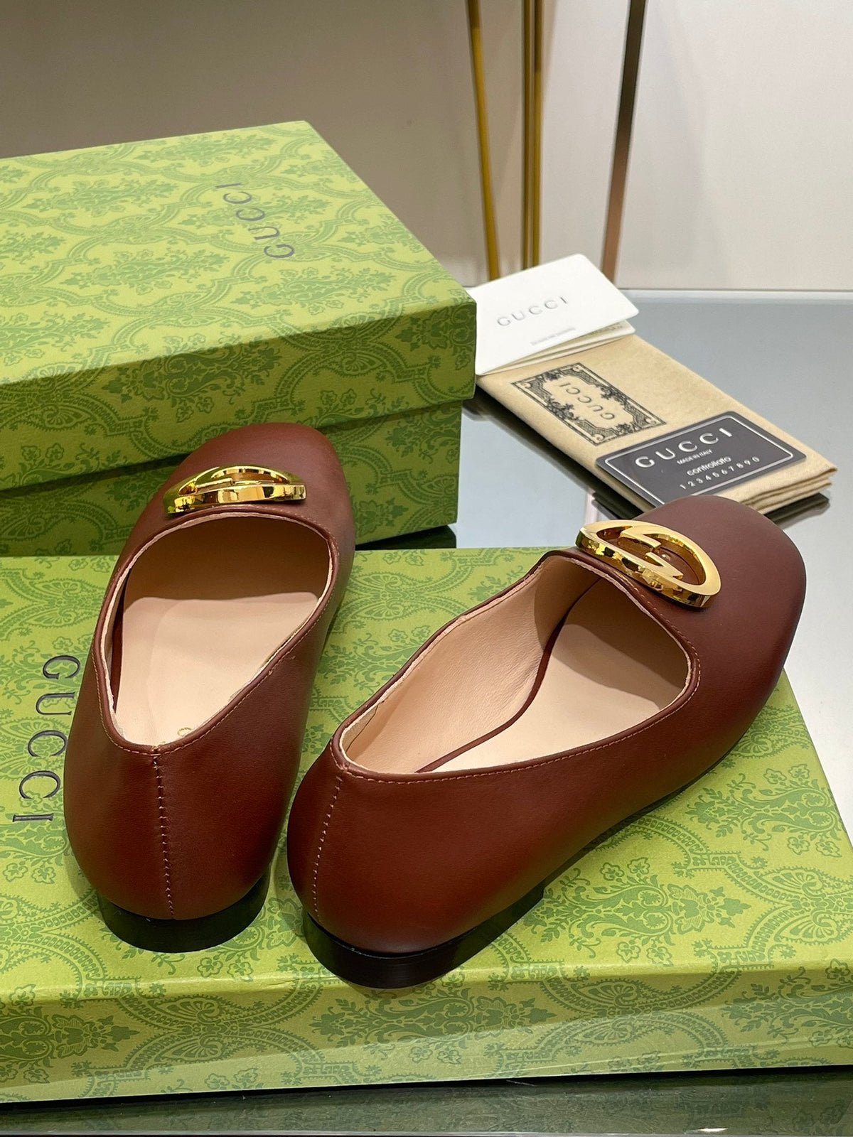 BLONDIE LOGO-PLAQUE LOAFERS IN SYRUP BROWN CALFSKIN WITH GOLD HARDWARE