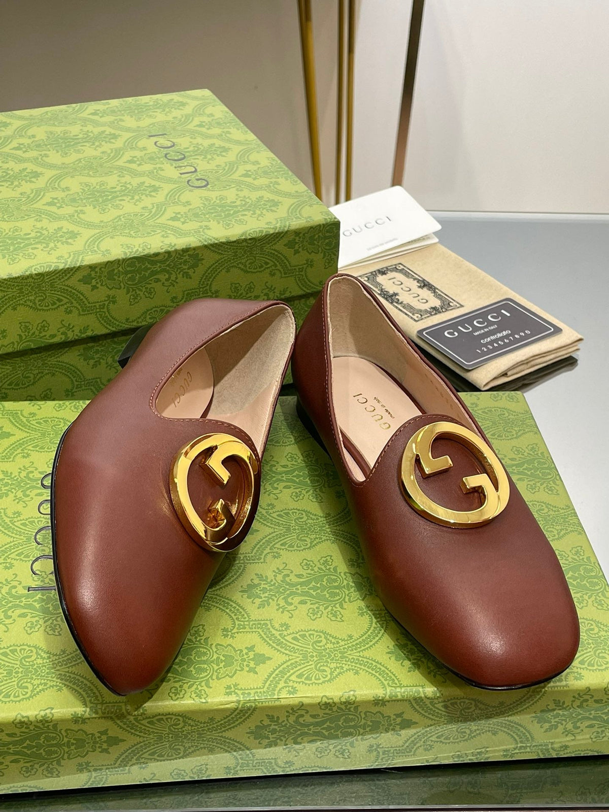BLONDIE LOGO-PLAQUE LOAFERS IN SYRUP BROWN CALFSKIN WITH GOLD HARDWARE