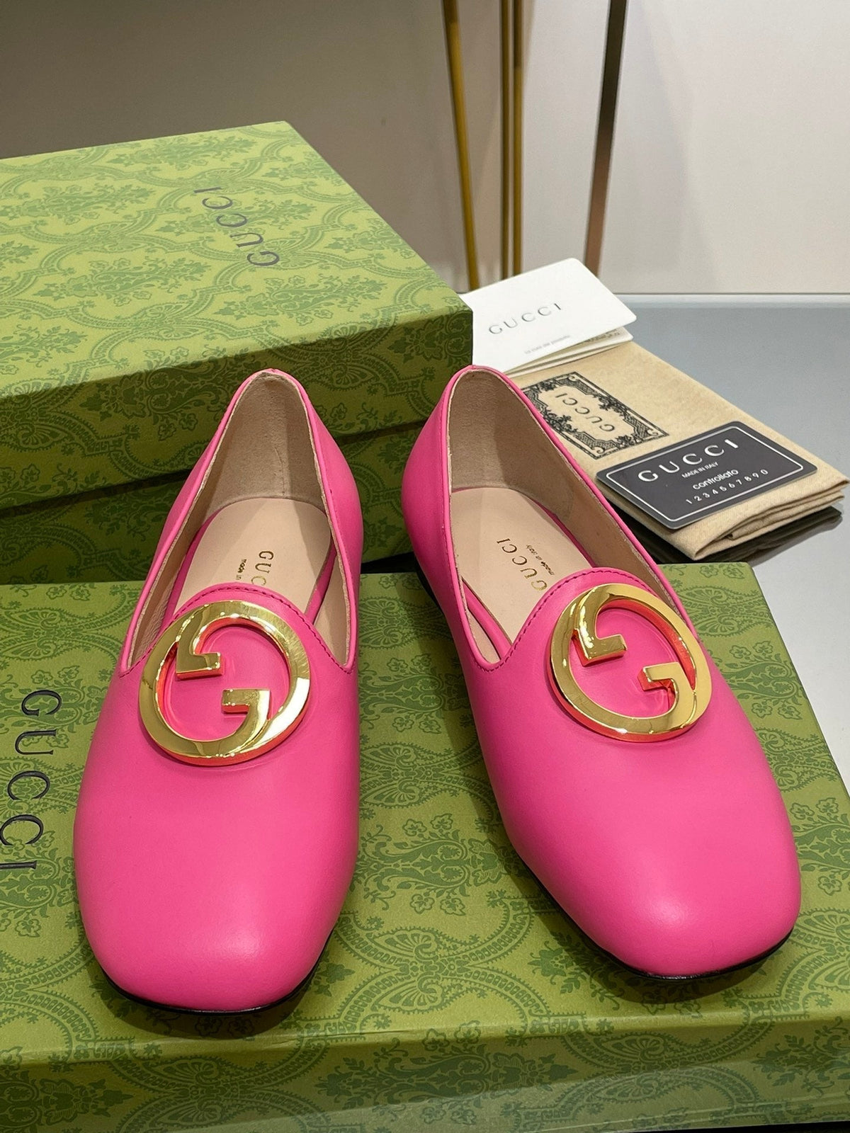 BLONDIE LOGO-PLAQUE LOAFERS IN BRIGHT PINK CALFSKIN WITH GOLD HARDWARE