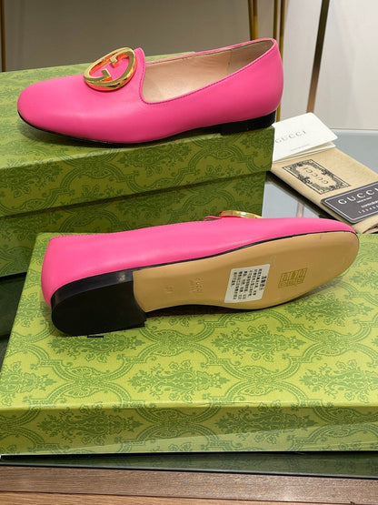 BLONDIE LOGO-PLAQUE LOAFERS IN BRIGHT PINK CALFSKIN WITH GOLD HARDWARE