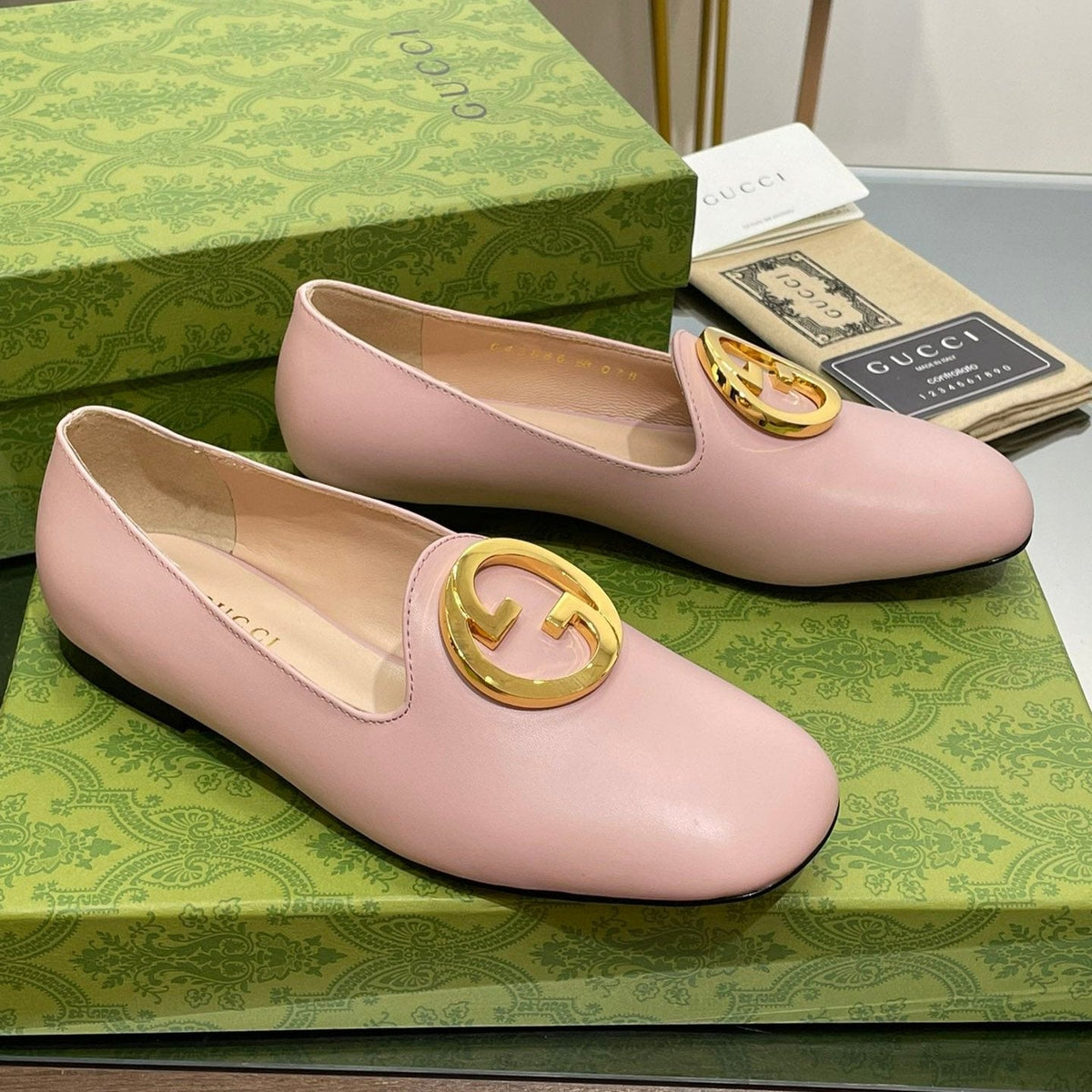 BLONDIE LOGO-PLAQUE LOAFERS IN LIGHT PINK CALFSKIN WITH GOLD HARDWARE