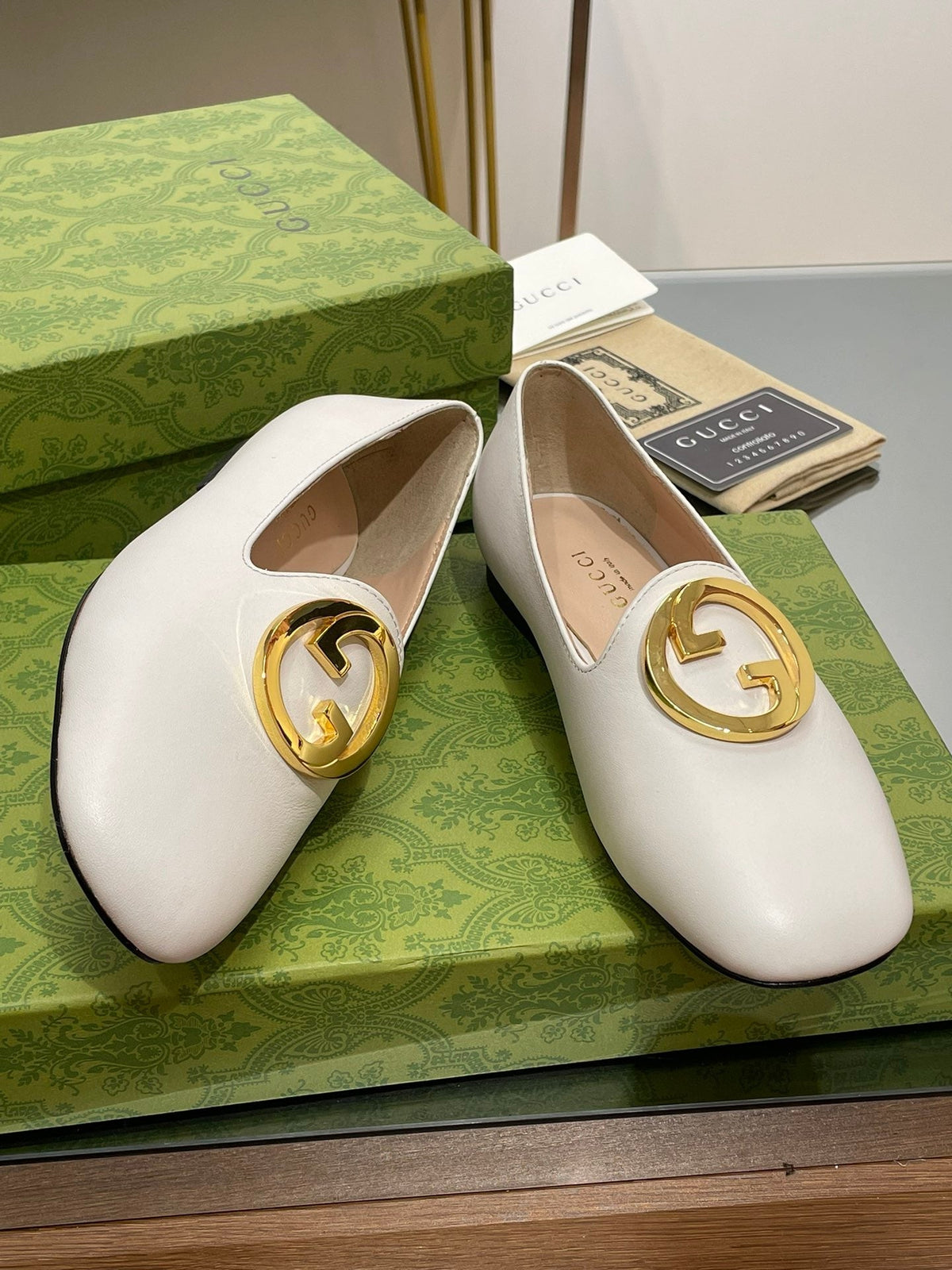 BLONDIE LOGO-PLAQUE LOAFERS IN WHITE CALFSKIN WITH GOLD HARDWARE