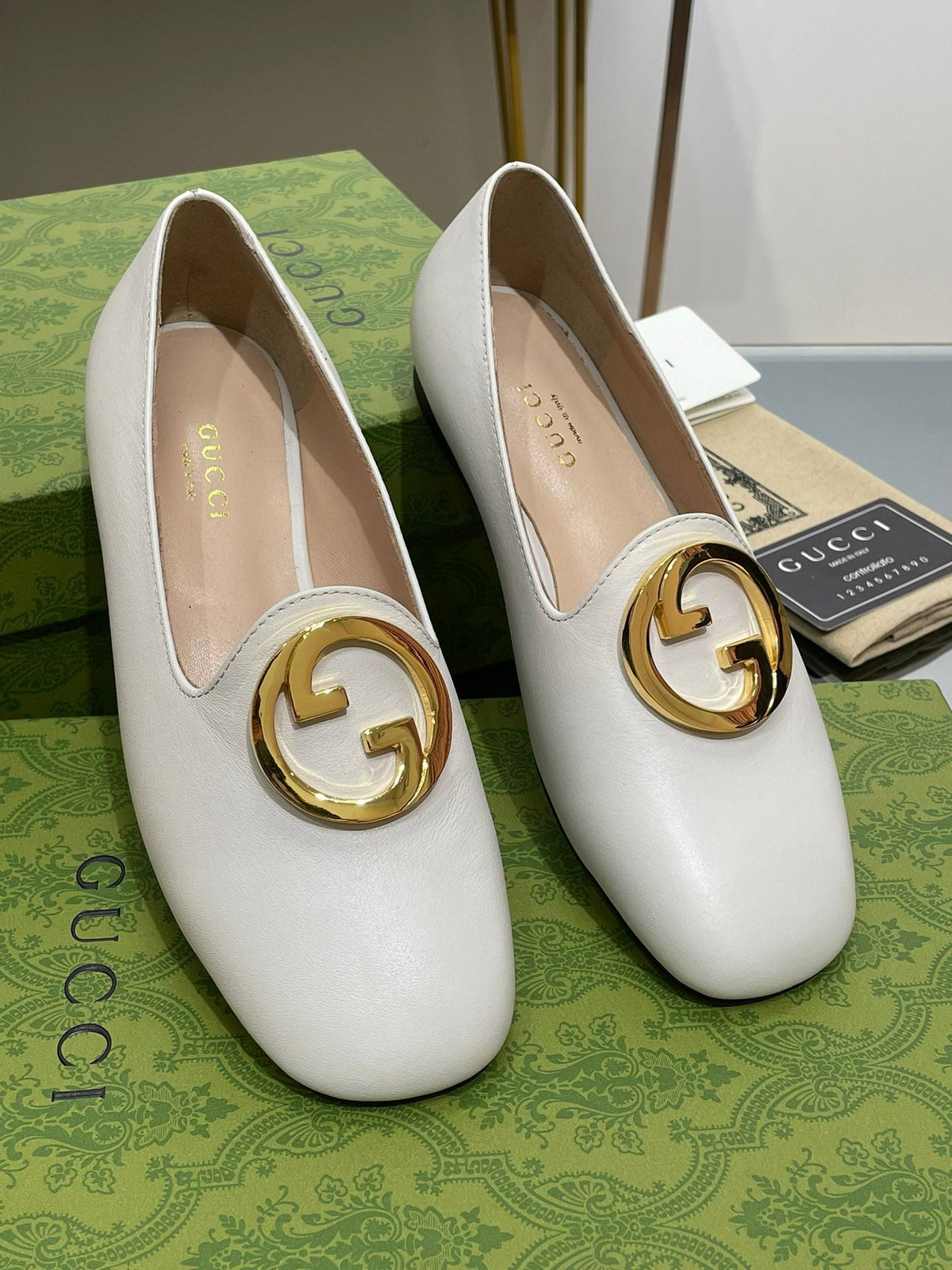 BLONDIE LOGO-PLAQUE LOAFERS IN WHITE CALFSKIN WITH GOLD HARDWARE