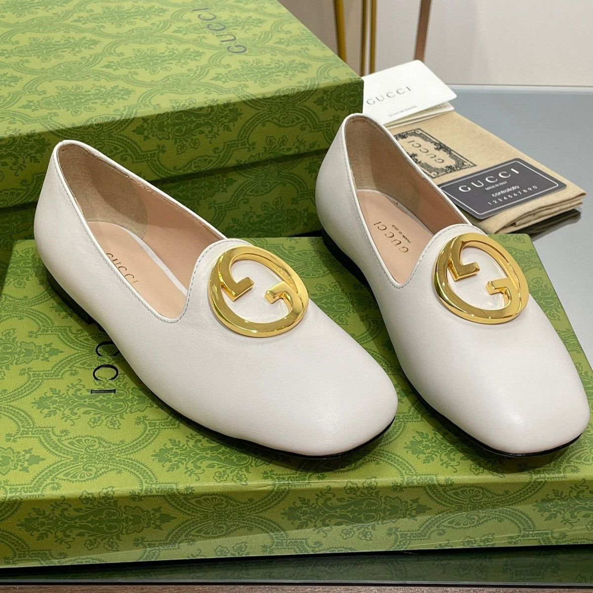BLONDIE LOGO-PLAQUE LOAFERS IN WHITE CALFSKIN WITH GOLD HARDWARE