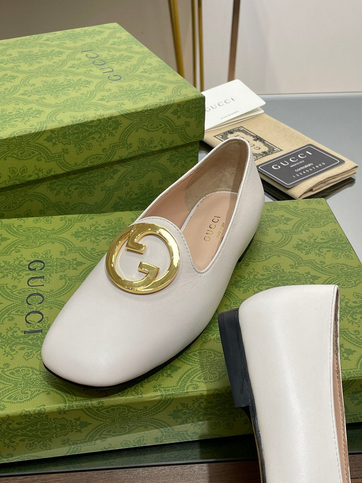 BLONDIE LOGO-PLAQUE LOAFERS IN WHITE CALFSKIN WITH GOLD HARDWARE