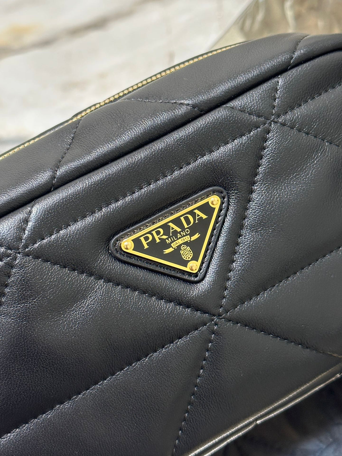 CAMERA BAG 22 IN BLACK TRIANGLE PATTERN QUILTED LAMBSKIN GOLD HARDWARE