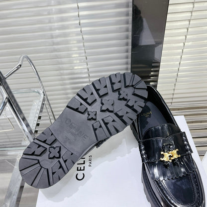 MARGARET CHUNKY LOAFER WITH FRINGES AND TRIOMPHE CHAIN IN POLISHED BULL GLOSSY BLACK