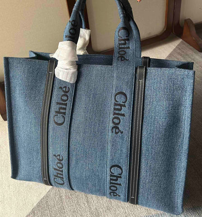 LAGRE WOODY TOTE BAG 45 IN BLUE DENIM BLACK CALFSKIN
